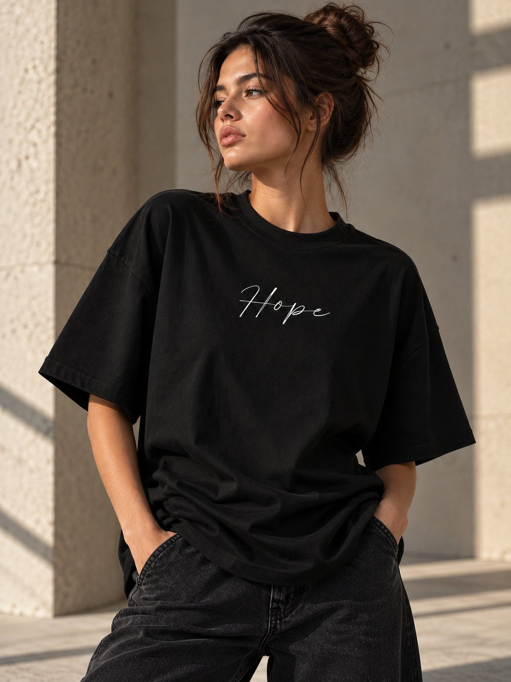Black oversized crew-neck T-shirt with short sleeves and 'Hope' script chest print